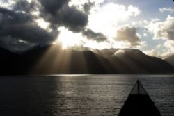 Sunshine after the rain. Patagonian fjord Chile by David Thompson 